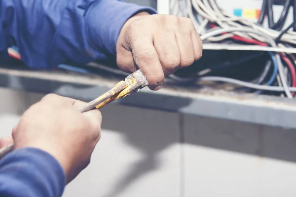 Electrician doing wiring work